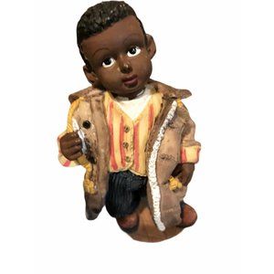 Collectible Afro American Colonial Boy With Jacket On.